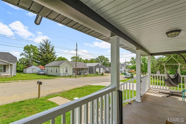 419 Murrill St, Bonne Terre, MO 63628 - view of patio featuring covered porch and a residential view