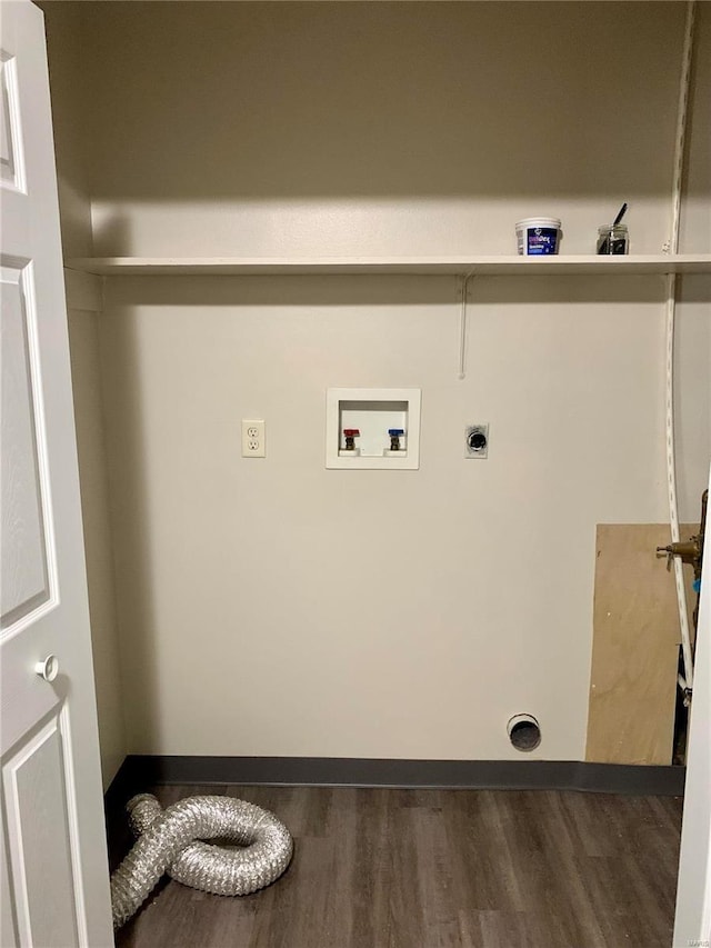 clothes washing area with hookup for a washing machine, electric dryer hookup, wood finished floors, and baseboards