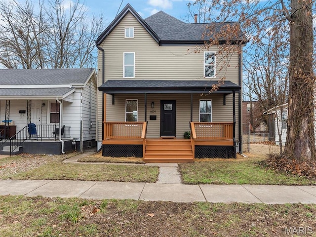 6634 Chamberlain Ave, University City, MO 63130 - view of front of property featuring a porch, a front yard, and roof with shingles