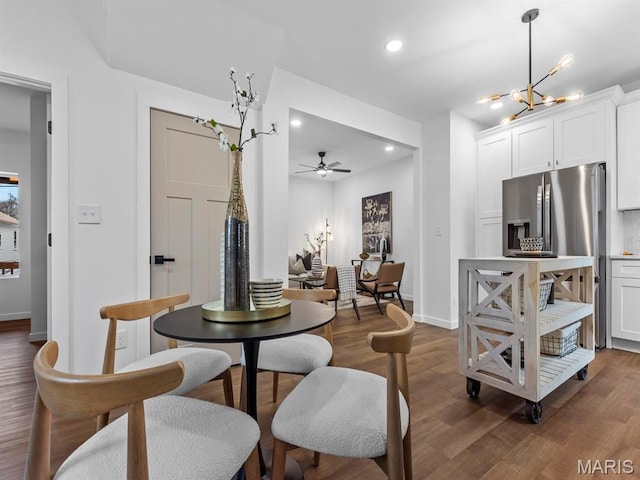 6634 Chamberlain Ave, University City, MO 63130 - dining area with recessed lighting, wood finished floors, a chandelier, and baseboards