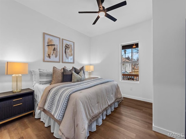 6634 Chamberlain Ave, University City, MO 63130 - bedroom with baseboards, dark wood-type flooring, and ceiling fan