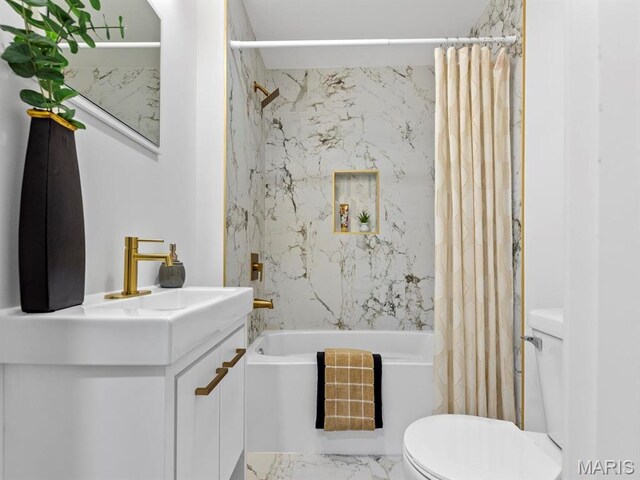 6634 Chamberlain Ave, University City, MO 63130 - bathroom with toilet, shower / tub combo, vanity, and marble finish flooring
