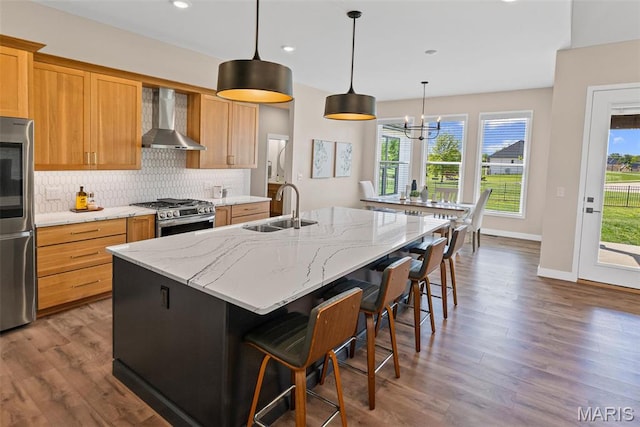 3837 Tanzanite Trl, Edwardsville, IL 62025 - kitchen with a sink, wall chimney exhaust hood, appliances with stainless steel finishes, dark wood-style floors, and recessed lighting