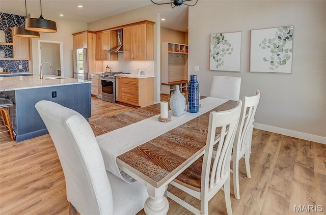 3837 Tanzanite Trl, Edwardsville, IL 62025 - dining room featuring light wood-style floors, recessed lighting, and baseboards