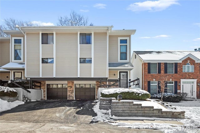 858 Lionsgate Dr, Saint Louis, MO 63130 - multi unit property featuring a garage and driveway