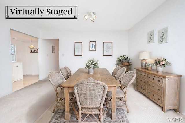 11741 Casa Grande Dr Unit G, Creve Coeur Township, MO 63146 - dining area with light carpet