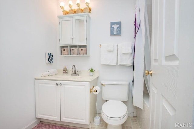 11741 Casa Grande Dr Unit G, Creve Coeur Township, MO 63146 - bathroom featuring toilet, vanity, baseboards, and a chandelier