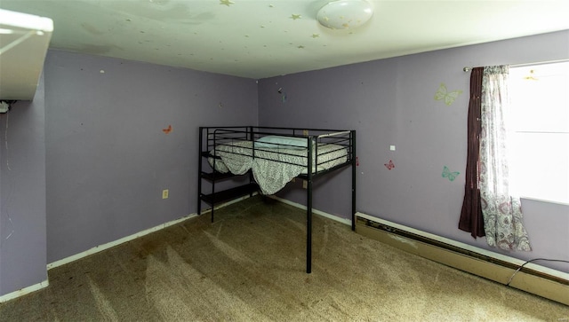 670 S Main St, Saint Clair, MO 63077 - unfurnished bedroom featuring baseboard heating, carpet, and baseboards