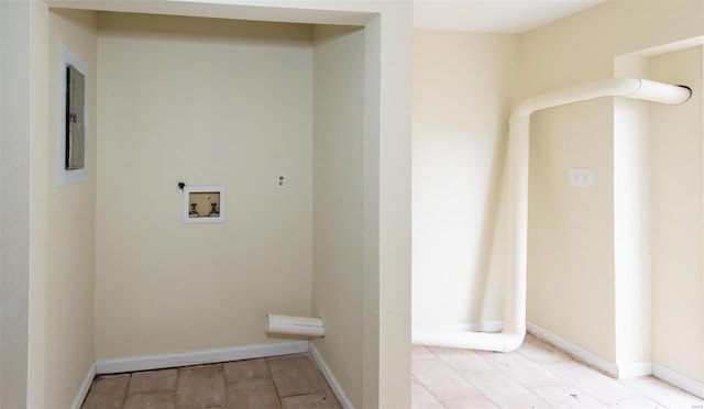 670 S Main St, Saint Clair, MO 63077 - clothes washing area featuring washer hookup and baseboards