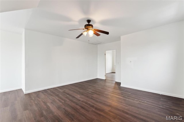 3142 Thelma Ave, Saint Louis, MO 63121 - unfurnished room featuring dark wood-style floors, a ceiling fan, and baseboards