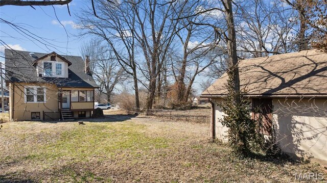 3142 Thelma Ave, Saint Louis, MO 63121 - view of grassy yard with entry steps