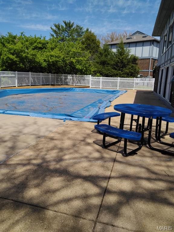 2316 Seven Pines Dr Unit 6, Saint Louis, MO 63146 - view of swimming pool featuring a patio area and fence