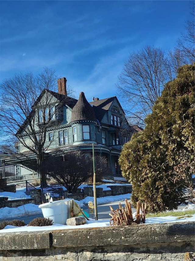 view of front of house with a chimney