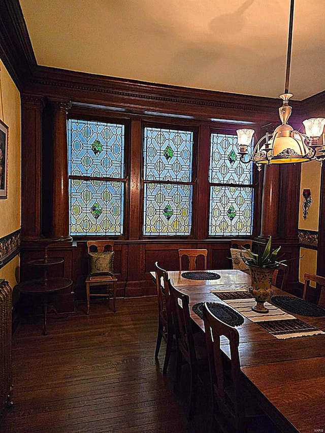 dining area featuring wood-type flooring