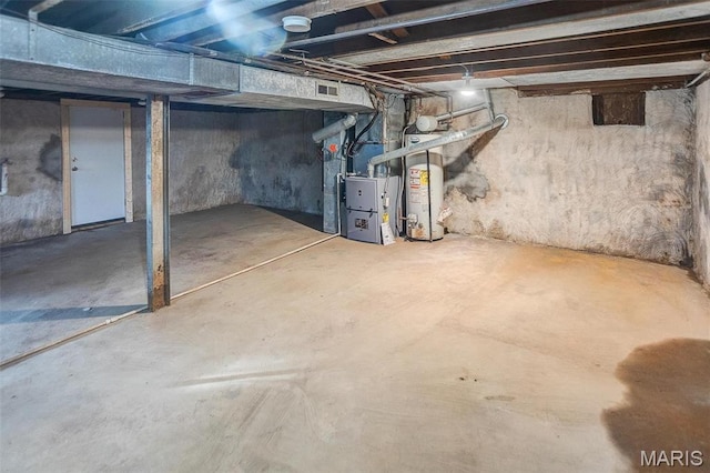 134 N 82nd St, Belleville, IL 62223 - unfinished below grade area featuring gas water heater and heating unit