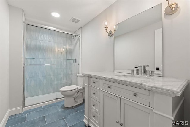 full bath with toilet, a stall shower, tile patterned floors, vanity, and recessed lighting