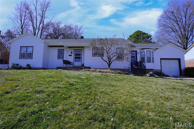 1014 Jefferson St, Hermann, MO 65041 - ranch-style house with an attached garage and a front lawn