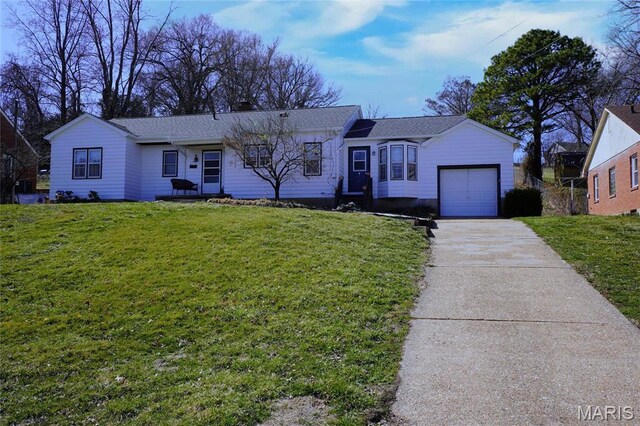 1014 Jefferson St, Hermann, MO 65041 - single story home with a garage, concrete driveway, a front lawn, and a shingled roof