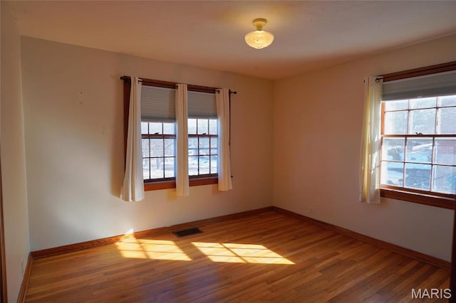 1014 Jefferson St, Hermann, MO 65041 - empty room featuring wood finished floors