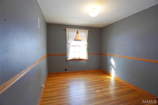 1014 Jefferson St, Hermann, MO 65041 - unfurnished room featuring wood finished floors and baseboards