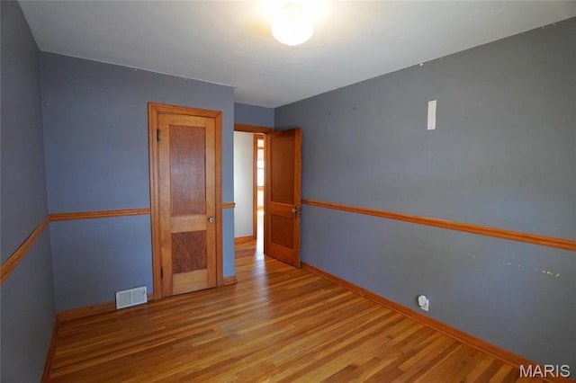 1014 Jefferson St, Hermann, MO 65041 - unfurnished room with wood finished floors