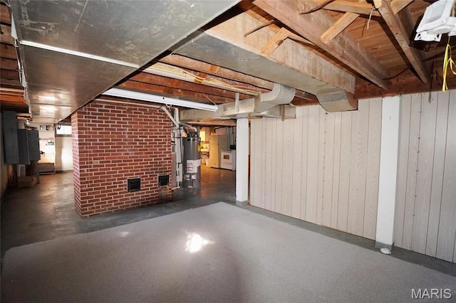 1014 Jefferson St, Hermann, MO 65041 - unfinished below grade area with gas water heater and wooden walls