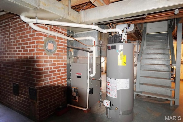 1014 Jefferson St, Hermann, MO 65041 - utility room featuring gas water heater and heating unit