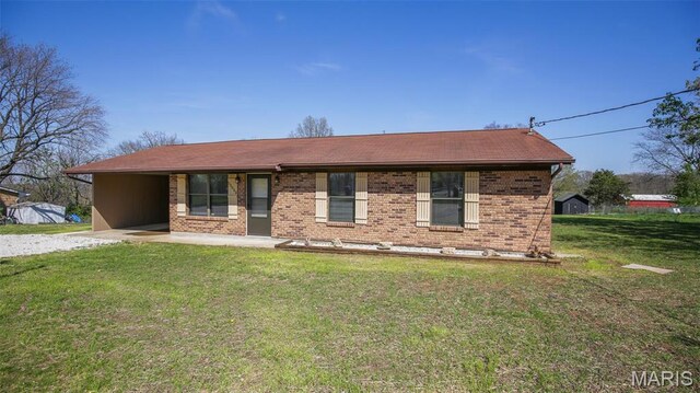 13060 Kimberly Ln, De Soto, MO 63020 - single story home featuring a front yard, brick siding, and driveway