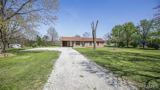 13060 Kimberly Ln, De Soto, MO 63020 - single story home featuring gravel driveway and a front lawn