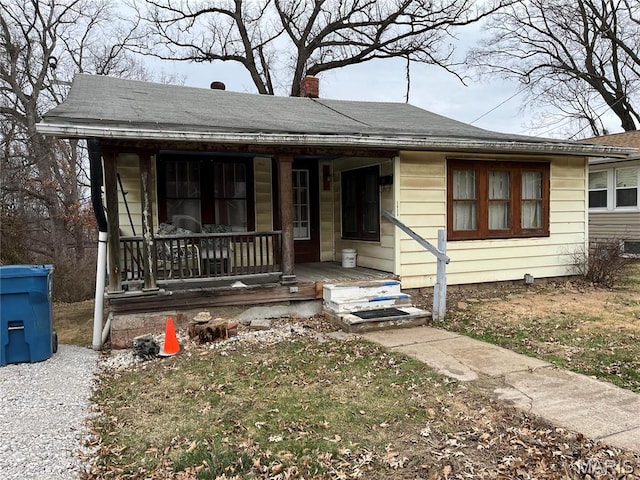 3620 Thomas Ave, Alton, IL 62002 - bungalow featuring covered porch, a chimney, and a shingled roof