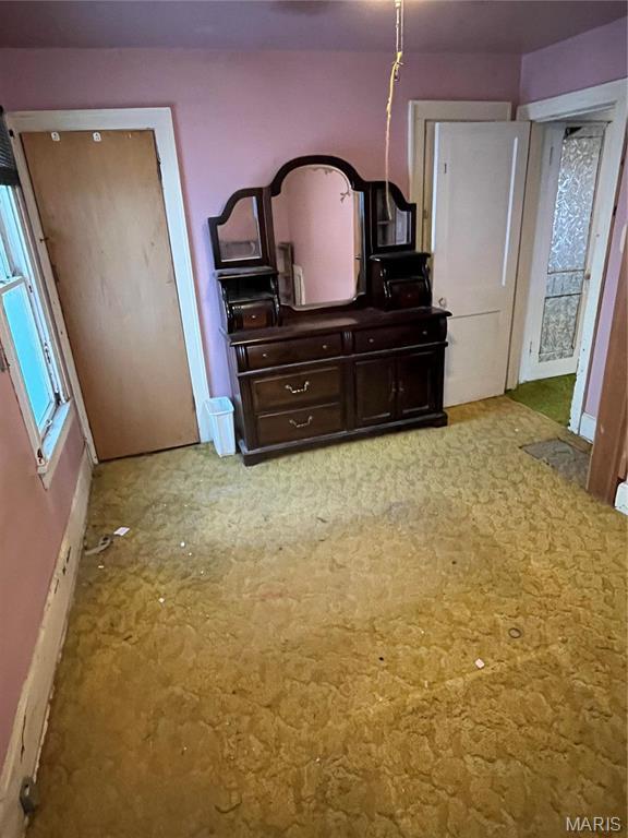 3620 Thomas Ave, Alton, IL 62002 - unfurnished bedroom with baseboards