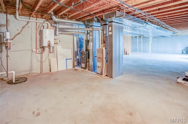 unfinished basement featuring water heater and heating unit