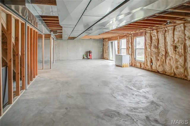 below grade area with refrigerator