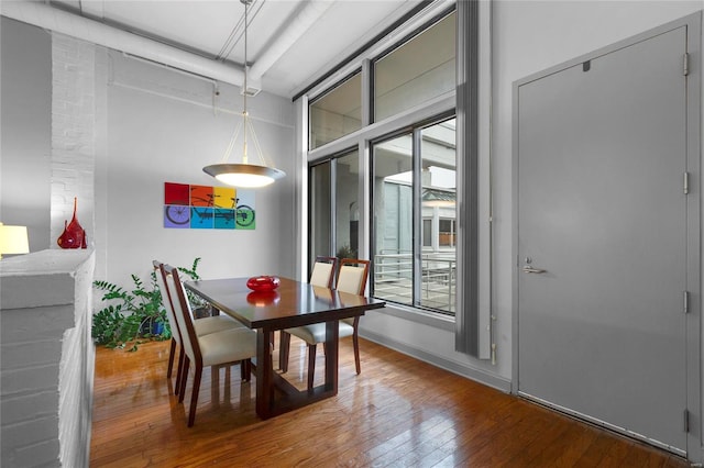 4100 Laclede Ave Unit 310, Saint Louis, MO 63108 - dining space with wood-type flooring and plenty of natural light