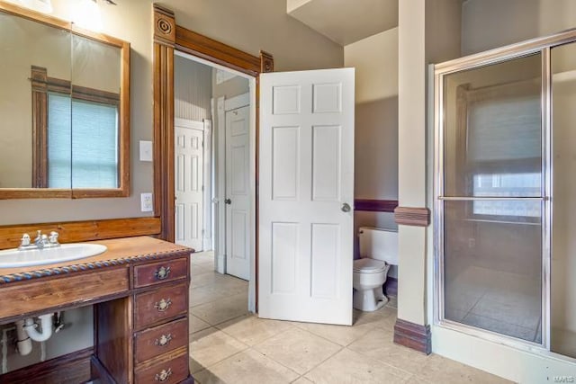 full bath with tile patterned floors, toilet, and vanity