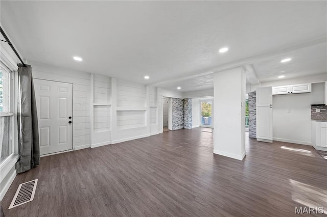 1919 Parker Rd, Saint Louis, MO 63138 - basement featuring dark wood-type flooring, recessed lighting, and baseboards