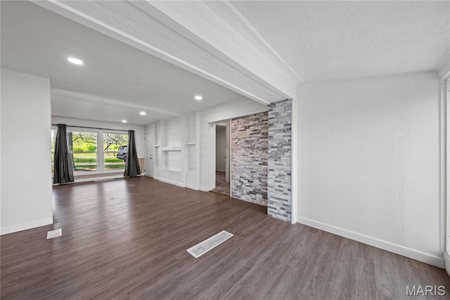 1919 Parker Rd, Saint Louis, MO 63138 - unfurnished living room featuring dark wood finished floors, baseboards, and recessed lighting