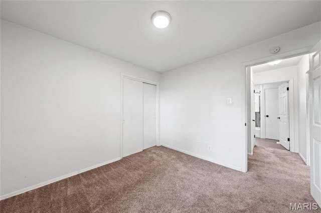 1919 Parker Rd, Saint Louis, MO 63138 - unfurnished bedroom featuring carpet floors, baseboards, and a closet