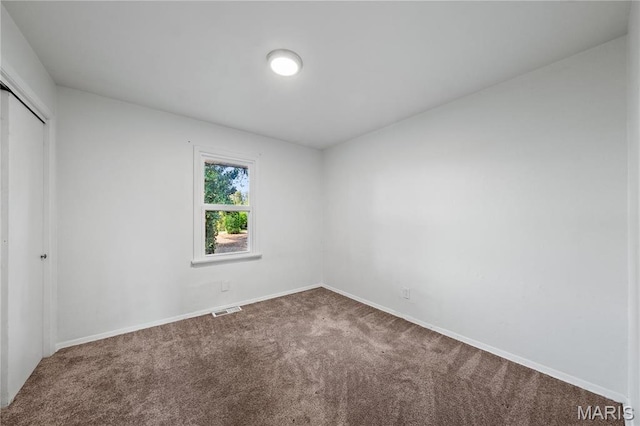 1919 Parker Rd, Saint Louis, MO 63138 - unfurnished bedroom featuring carpet flooring, a closet, and baseboards