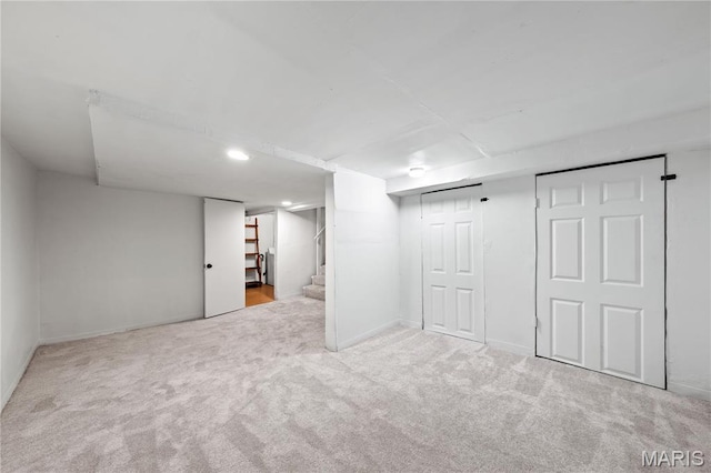 1919 Parker Rd, Saint Louis, MO 63138 - finished basement with carpet, stairs, and baseboards