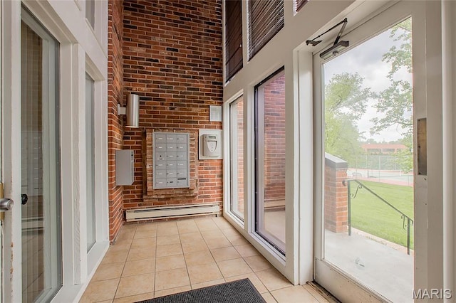 585 Coeur De Royale Dr Unit 206, Creve Coeur, MO 63141 - unfurnished sunroom featuring baseboard heating