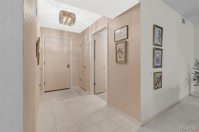 585 Coeur De Royale Dr Unit 206, Creve Coeur, MO 63141 - corridor with baseboards and light tile patterned floors