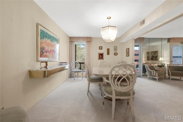 585 Coeur De Royale Dr Unit 206, Creve Coeur, MO 63141 - carpeted dining area with a chandelier