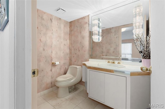 585 Coeur De Royale Dr Unit 206, Creve Coeur, MO 63141 - half bathroom featuring vanity, a chandelier, and tile patterned floors