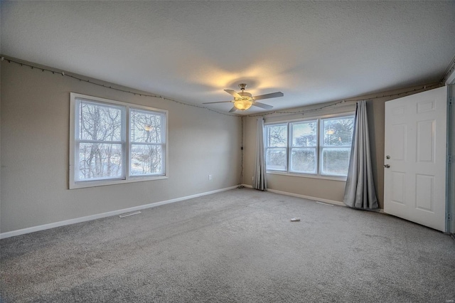 1311 Beck, Lebanon, MO 65536 - spare room with carpet floors, baseboards, and ceiling fan