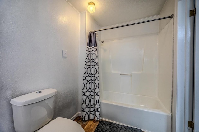 1311 Beck, Lebanon, MO 65536 - full bathroom featuring wood finished floors, toilet, baseboards, and shower / tub combo with curtain