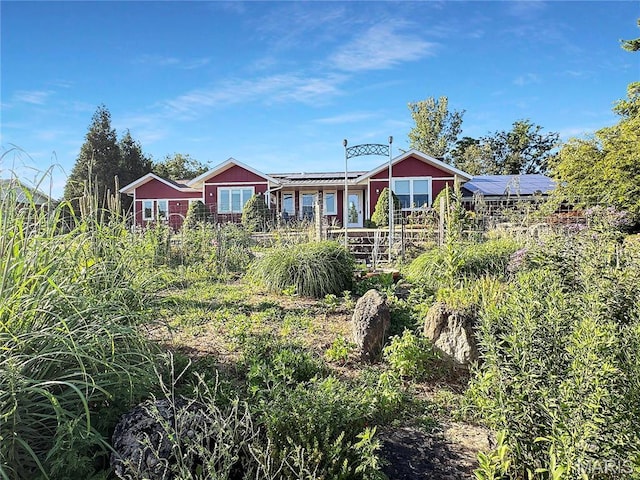 501 4th St W, Hermann, MO 65041 - back of house with solar panels and fence