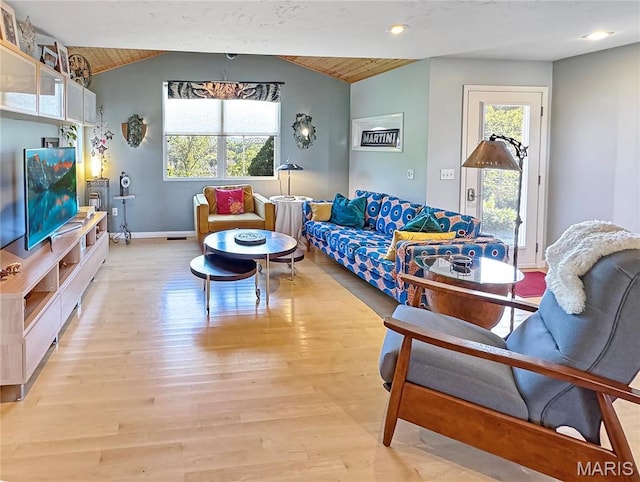 501 4th St W, Hermann, MO 65041 - living room featuring vaulted ceiling, light wood finished floors, plenty of natural light, baseboards, and wooden ceiling