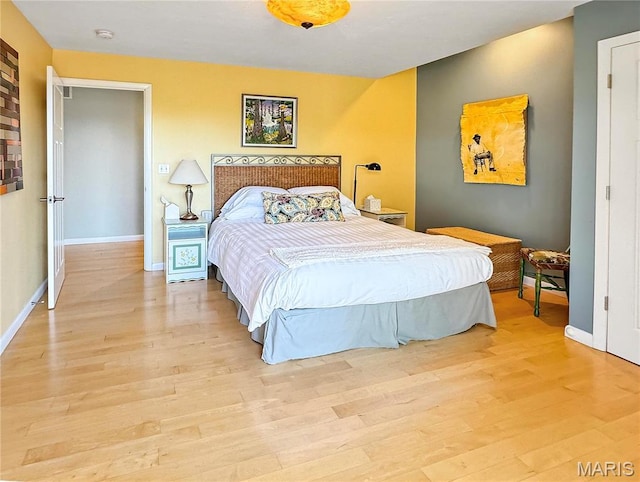 501 4th St W, Hermann, MO 65041 - bedroom with light wood-type flooring and baseboards
