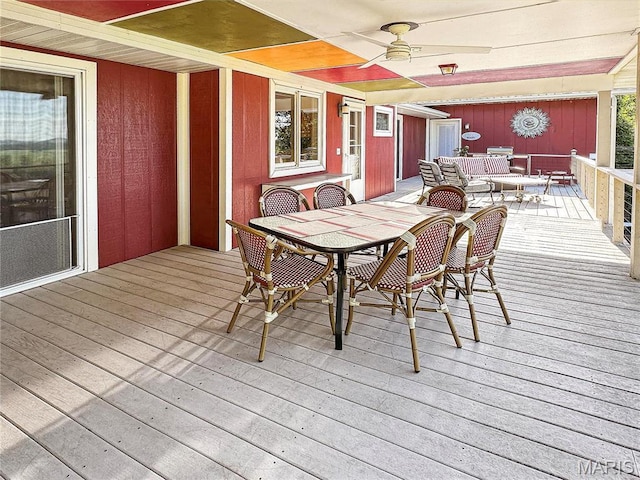 501 4th St W, Hermann, MO 65041 - wooden terrace featuring outdoor dining area and ceiling fan
